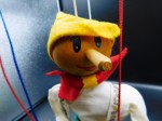 german puppet yellow hat face